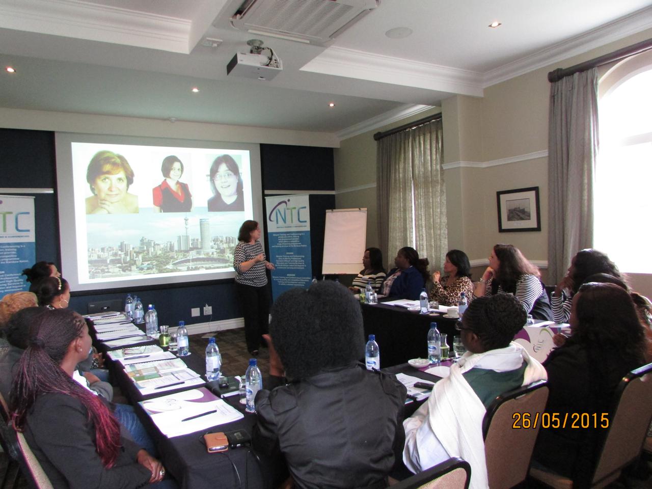 Training session participants in a classroom